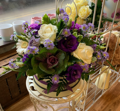 Purple Luxe Hat Box - A striking purple and cream hat box arrangement, perfect for birthdays, anniversaries, thank yous or congratulations, handcrafted by Pursehouse Florist in Cannock.