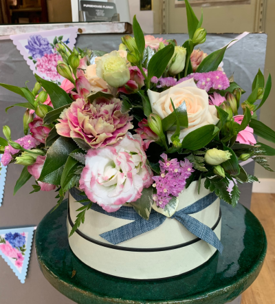 Pink Champagne Hat Box - A pretty pink and cream hat box arrangement, perfect for birthdays, anniversaries, thank yous, or congratulations, handcrafted by Pursehouse Florist in Cannock.